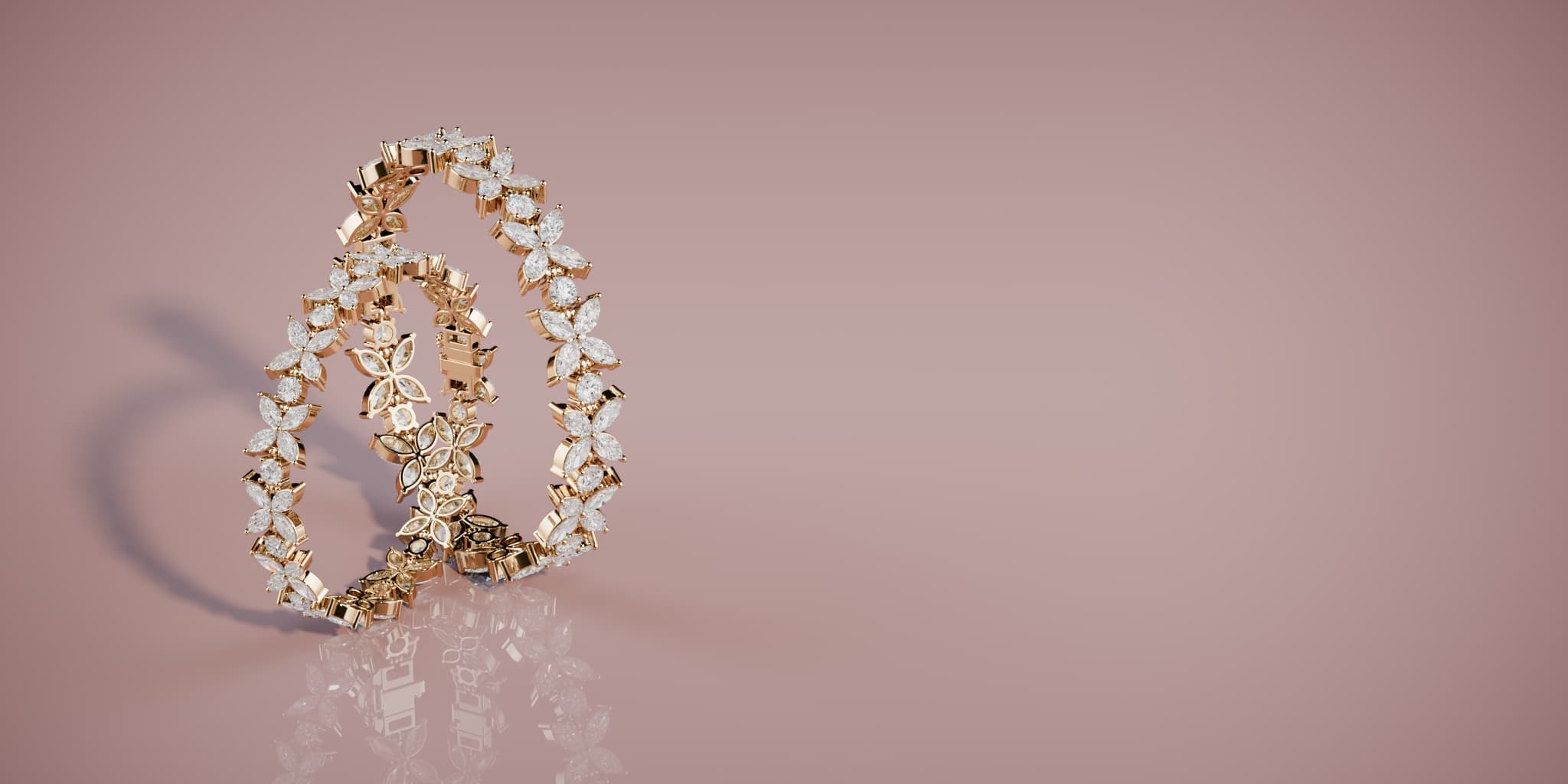 still frame from a 360 video of two rose gold diamond bangles