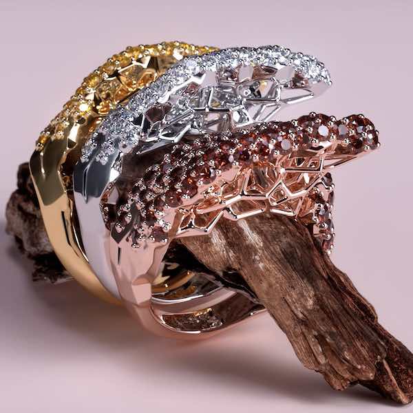 the same ring rendered in three gold colors