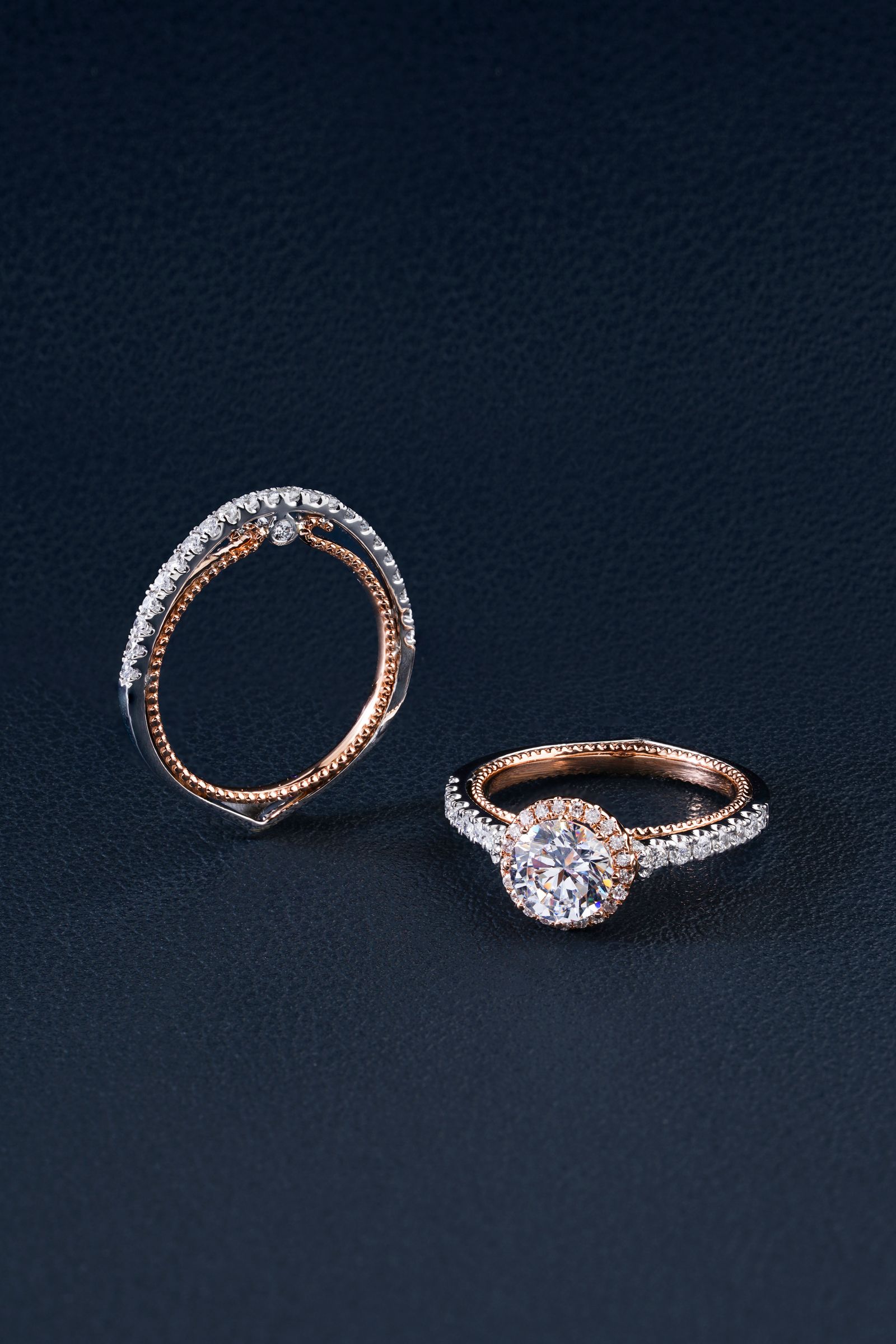 rose gold bridal ring set rendered on a deep navy ground