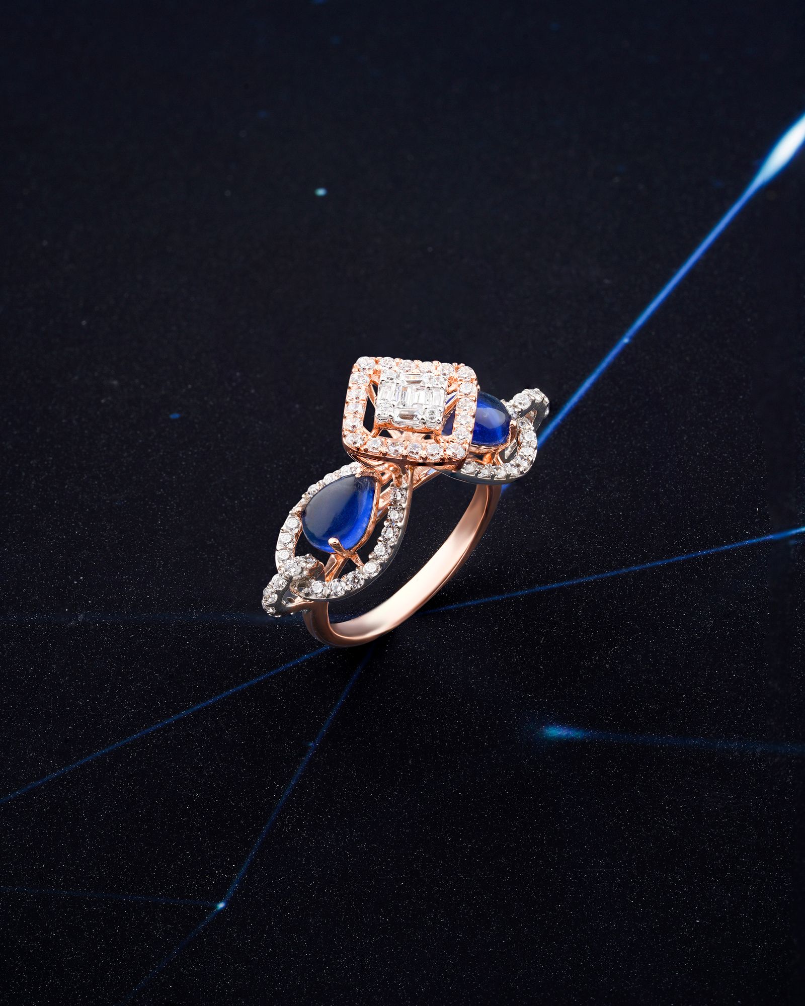 sapphire and diamond halo ring rendered on a dark ground